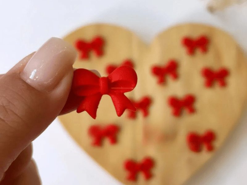 Biscuit Comestível Laços Vermelho c/ 10 unidades -  Meninas do Açúcar