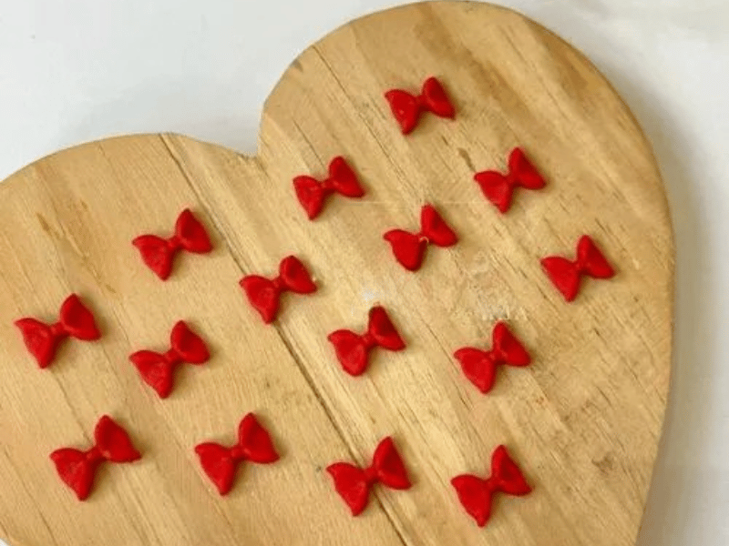 Biscuit Comestível Micro Laços Vermelho c/ 25 unidades -  Meninas do Açúcar